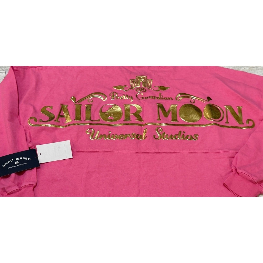 NWT Sailor Moon Universal Studios Orlando Spirit Jersey Pink Gold Foil XS New